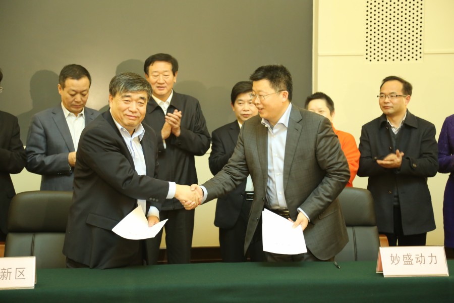 沈北新區(qū)區(qū)長(zhǎng)金志生與邱則有簽約